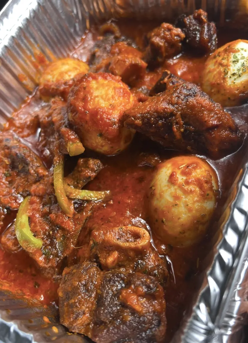 Meat and eggs in sauce